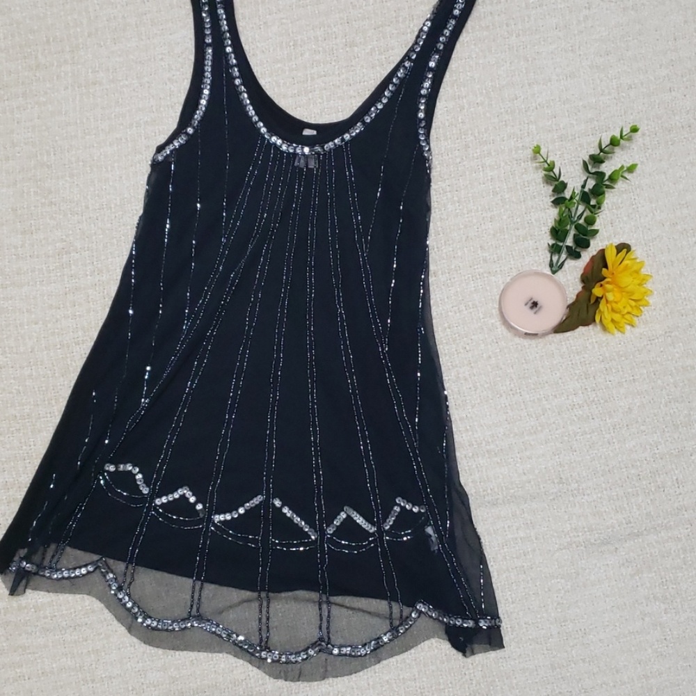 Sequence and beaded tank